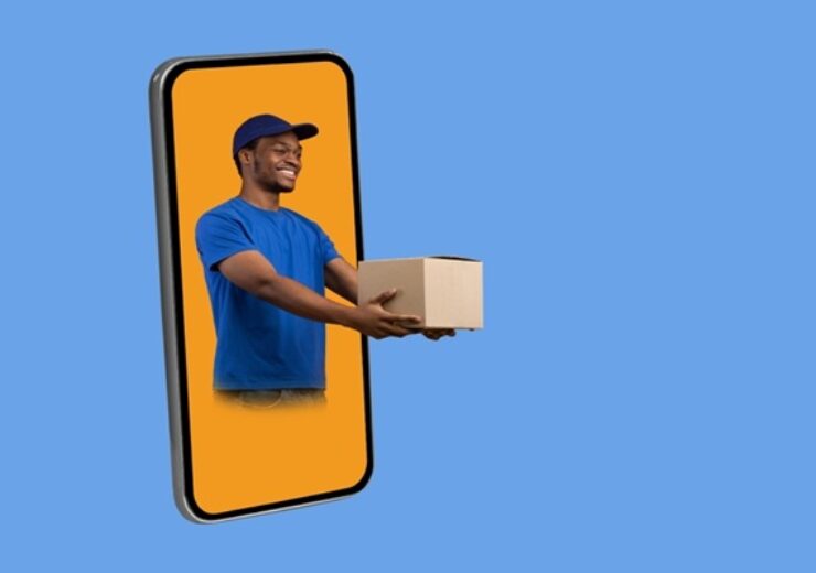 Parcel,Shipping,App.,Black,Deliveryman,In,Phone,Screen,Giving,Cardboard