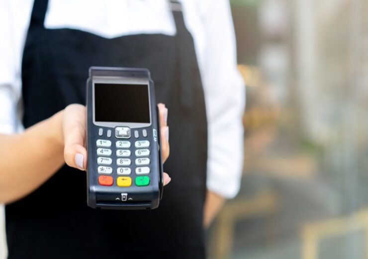 Close,Up,Waitress,Worker,Hand,Showing,An,Electronic,Banking,Money