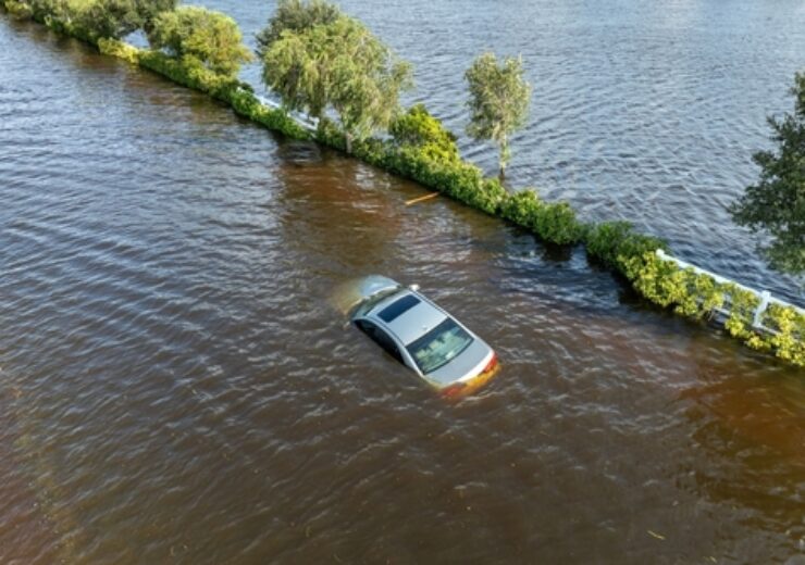 Flooded,Florida,Street,With,Stuck,Car,After,Hurricane,Debby,Rainfall