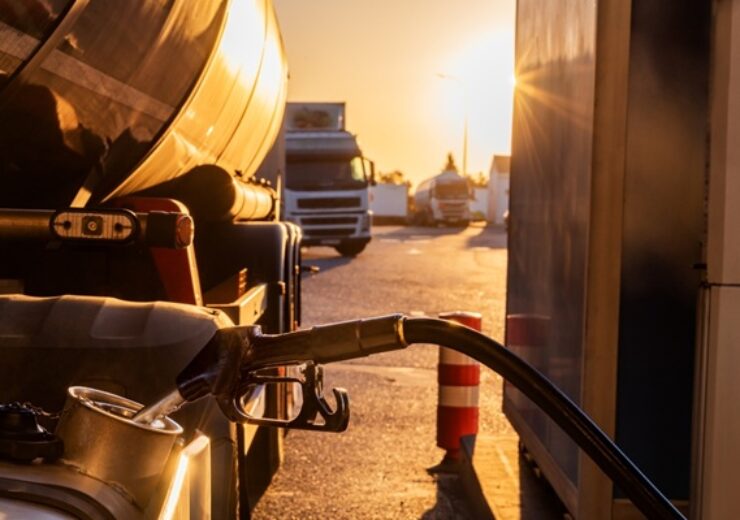 Filling,The,Fuel,Tank,Of,A,Truck,At,A,Gas