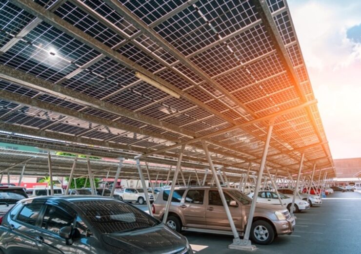 Solar,Panels,Installed,Over,Parking,Lot,With,Parked,Cars,For