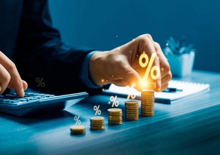 Business,Professional,Calculating,Financial,Interest,Growth,By,Stacking,Gold,Coins