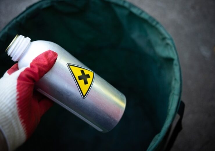 A,Black,Cross,In,A,Yellow,Triangle.disposal,Of,Harmful,Waste.