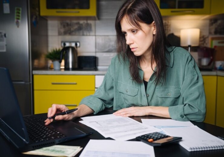 Woman,Calculate,And,Filling,Us,Tax,Form,1040,In,Tax