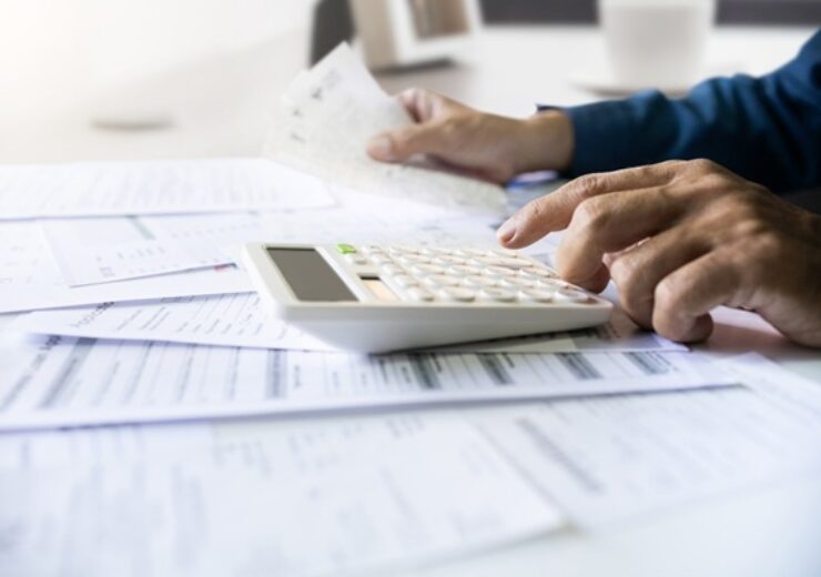 Close-up,Shot.,Asian,Men,Hand,Using,Calculator,To,Calculate,Expenses